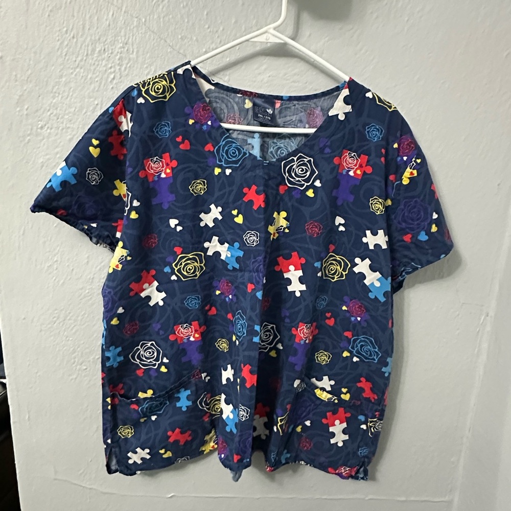 Zoe + Chloe Blue Puzzle Piece and Roses Scrub Top